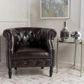 Fauteuil club en similicuir capitonné de